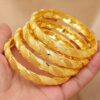 4pcs Luxurious Golden-Tone Bangle Set - Elegant Open Cuff Design for Women, Perfect for Weddings & Casual Attire - Image 4